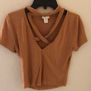 orange cropped shirt